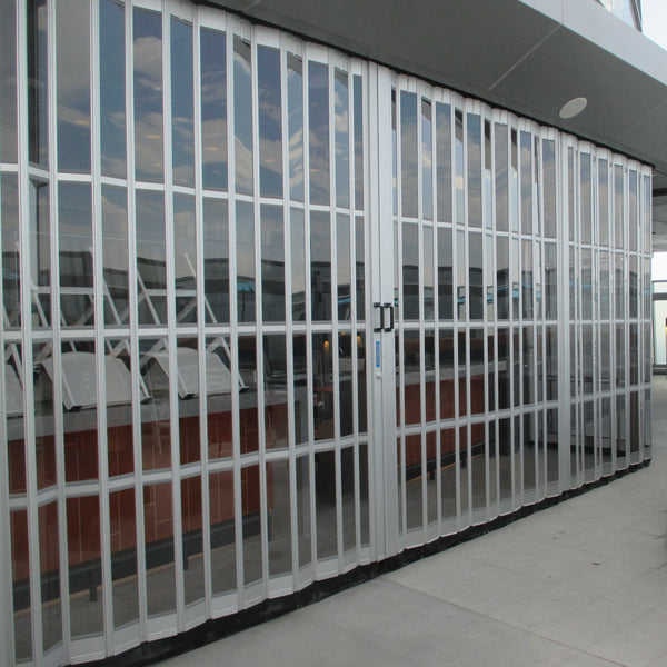 Cheap Japanese commercial shop pvc polycarbonate slat accordion folding sliding door on China WDMA