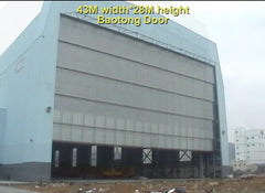 Low price custom made vertical lifting sectional sliding industy door on China WDMA on China WDMA