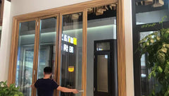 Coastal Storm Resistance Aluminium soundproof outdoor folding door prices glass american door on China WDMA